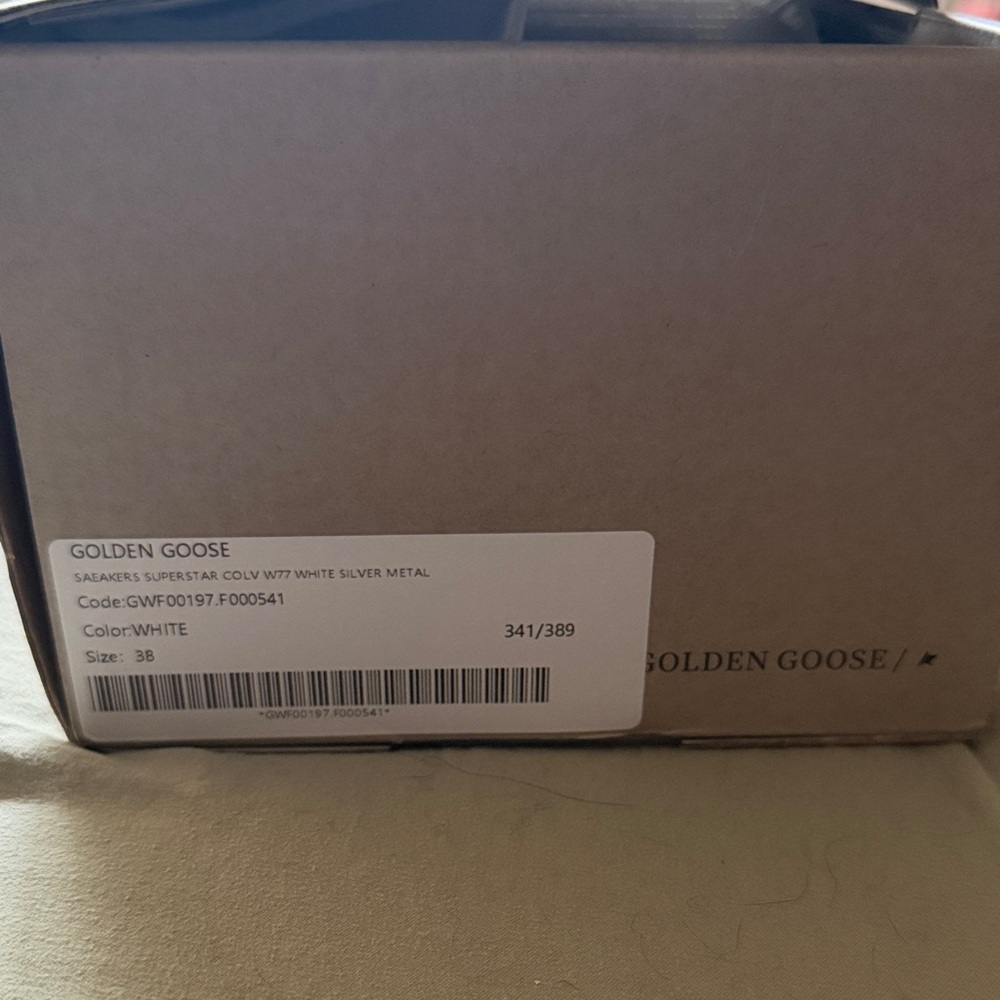 Golden Goose White and Silver Sneakers